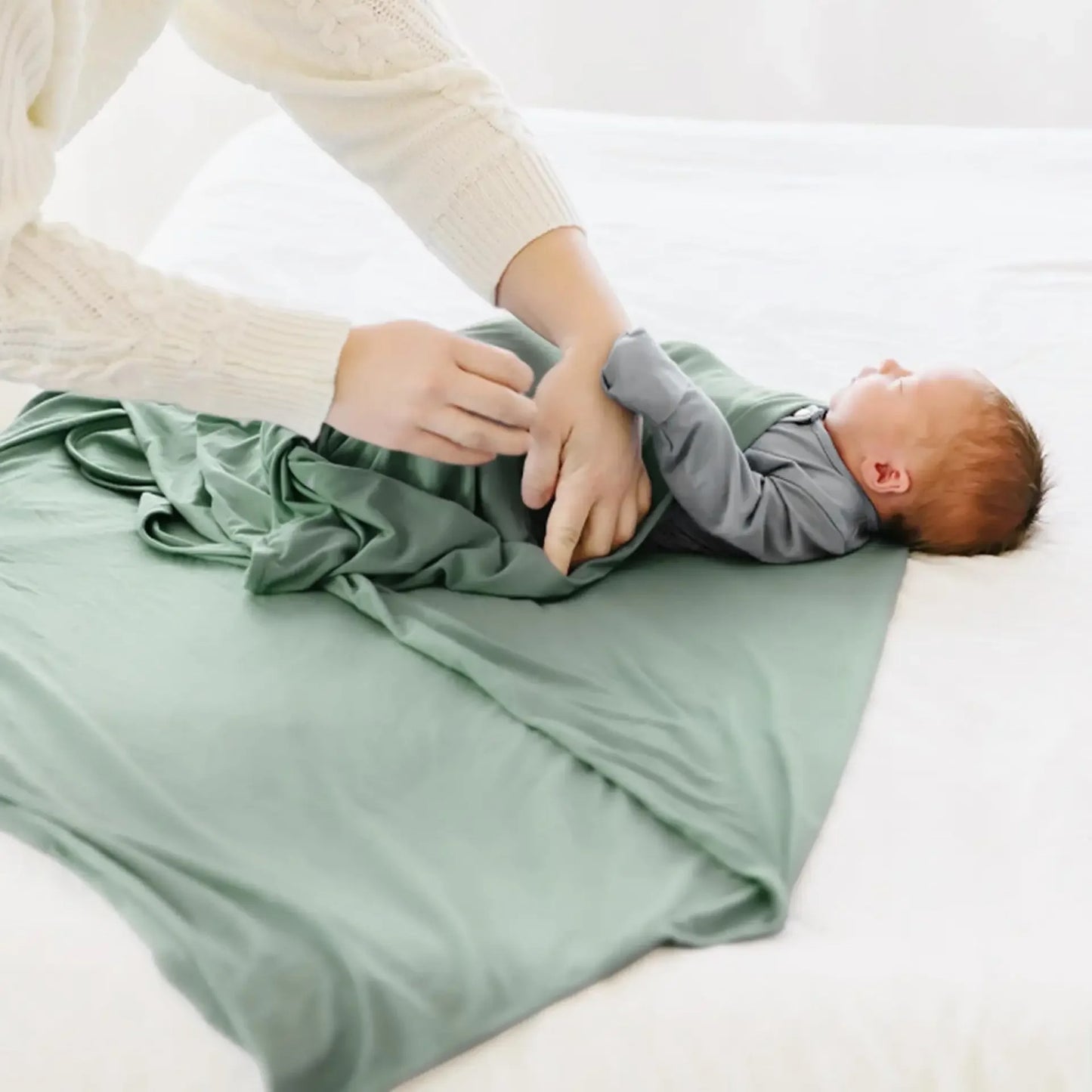 Étapes de pliage de lange d emmaillotage cocooning