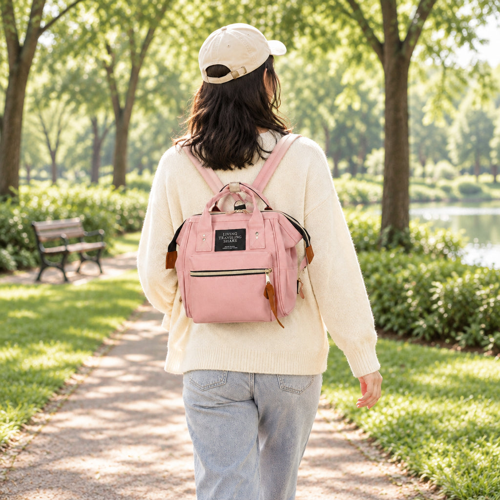 Femme-porte-sur-dos-sac-à-dos-à-langer-coquet-portage-léger