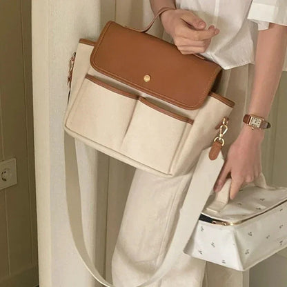 Femme-porte-sac-à-langer-Tendance™-et-autre-petit-sac
