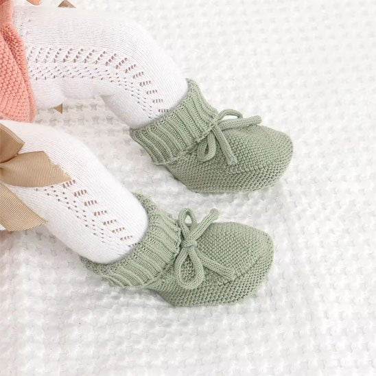 Fillette porte chausson bébé confort vert