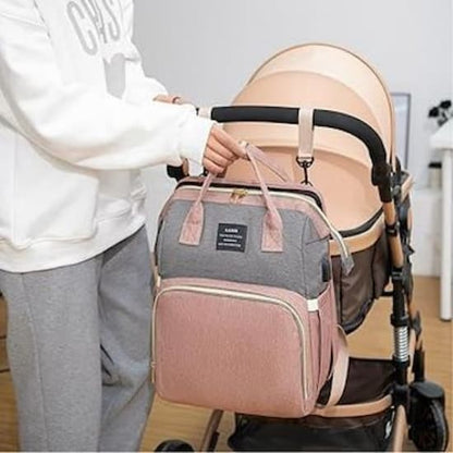 Sac à dos à langer ergonomique rose sur poussette