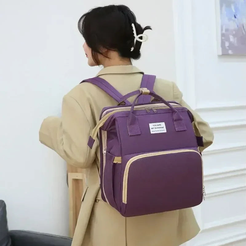 Sac-à-dos-à-langer-voyage-mauve