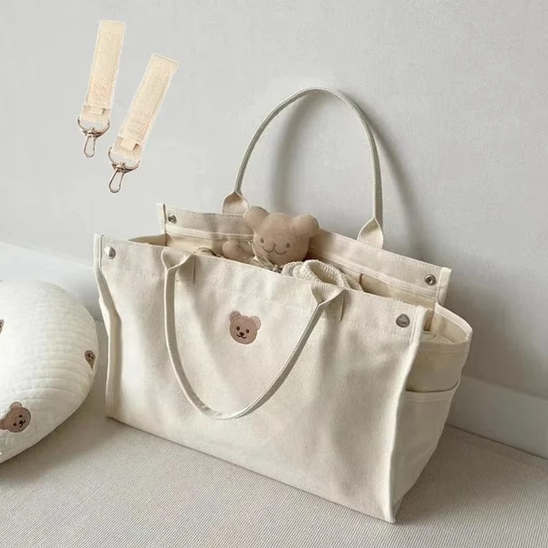 Toutou-dans-sac-à-langer-mignon-spacieux